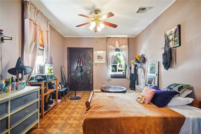 bedroom featuring visible vents, ornamental molding, and multiple windows