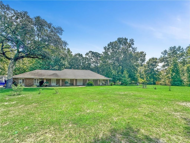 view of front of home with a front lawn