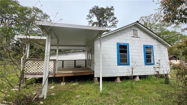 39202 Pine St, Pearl River, LA 70452 - view of side of property with a yard and a deck