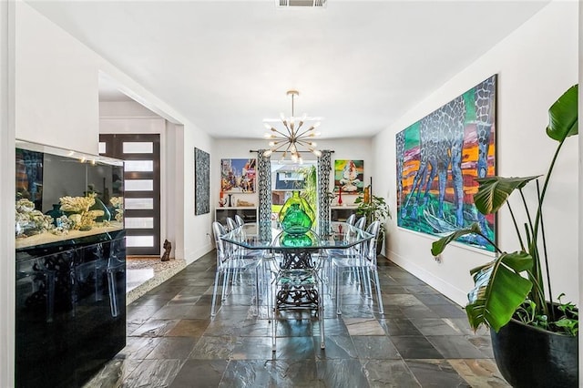 66 Carolyn Ct, Arabi, LA 70032 - dining area with a chandelier, stone tile floors, and healthy amount of natural light