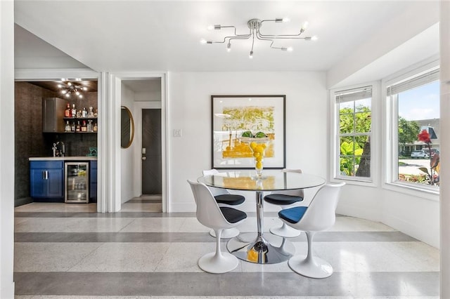 66 Carolyn Ct, Arabi, LA 70032 - dining room featuring wine cooler and bar
