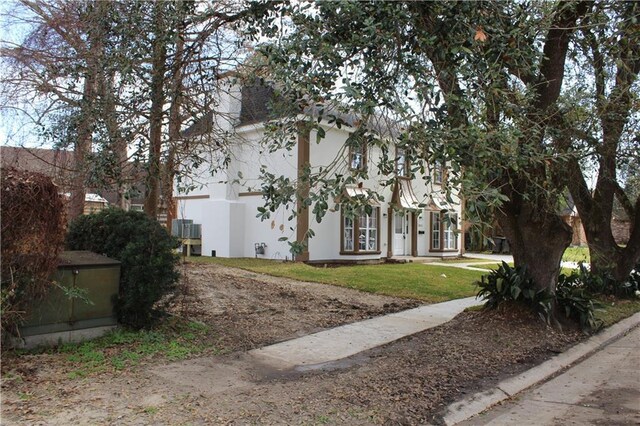 3810 Tall Pines Dr, New Orleans, LA 70131 - entryway with dark wood-style flooring, ornamental molding, stairs, and baseboards