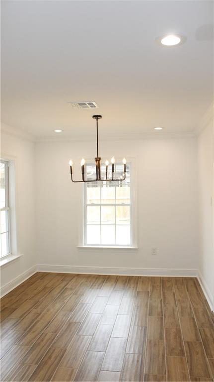3810 Tall Pines Dr, New Orleans, LA 70131 - kitchen featuring stainless steel appliances, a sink, decorative backsplash, and white cabinetry