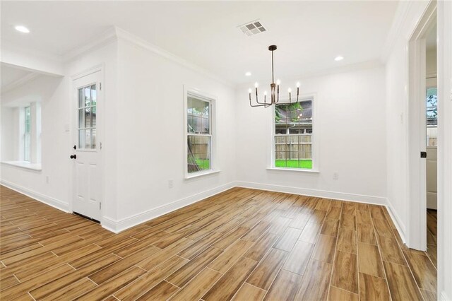 3810 Tall Pines Dr, New Orleans, LA 70131 - unfurnished dining area with a chandelier, wood finished floors, crown molding, baseboards, and recessed lighting