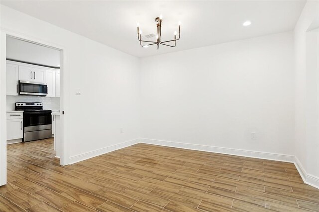 3810 Tall Pines Dr, New Orleans, LA 70131 - empty room with ceiling fan, dark wood-style floors, and baseboards
