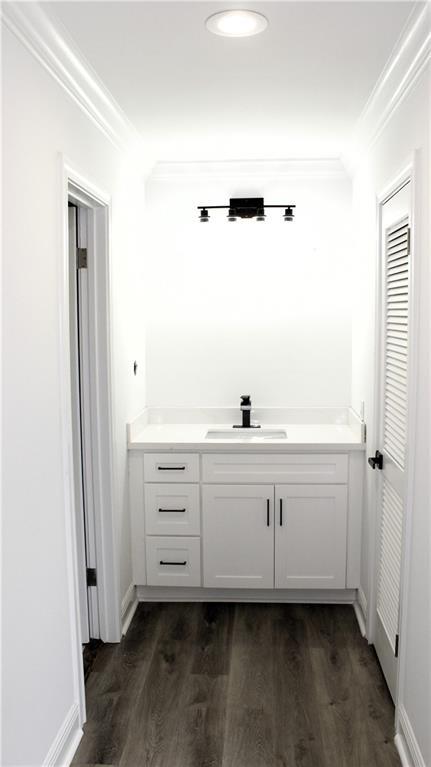 3810 Tall Pines Dr, New Orleans, LA 70131 - washroom with wood finish floors, hookup for a washing machine, and baseboards