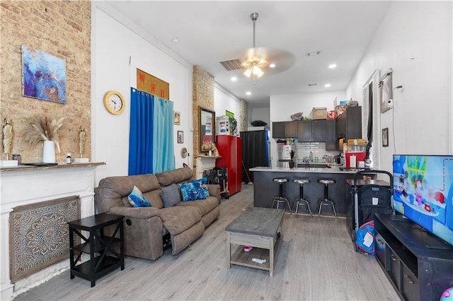 2612-14 Orleans Ave, New Orleans, LA 70119 - living area featuring ceiling fan, light wood-type flooring, and recessed lighting