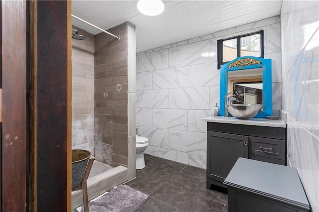 2612-14 Orleans Ave, New Orleans, LA 70119 - bathroom with vanity, tiled shower, and tile patterned flooring