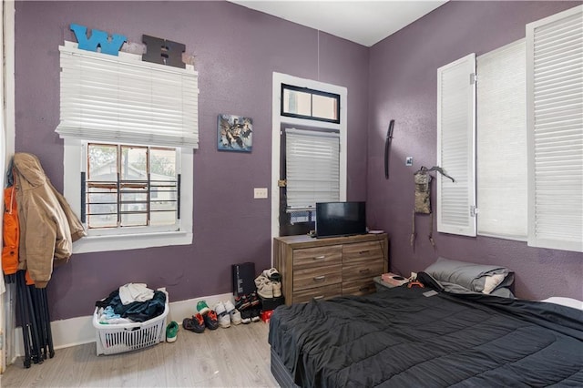 2612-14 Orleans Ave, New Orleans, LA 70119 - bedroom with wood finished floors and baseboards