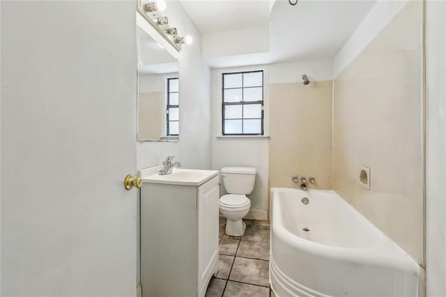 8936 Curran Blvd, New Orleans, LA 70127 - full bath with vanity, toilet, tile patterned flooring, and tub / shower combination
