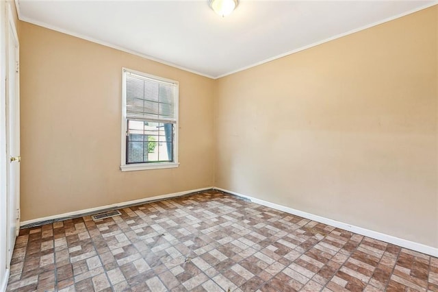 8936 Curran Blvd, New Orleans, LA 70127 - empty room featuring visible vents, brick floor, baseboards, and crown molding