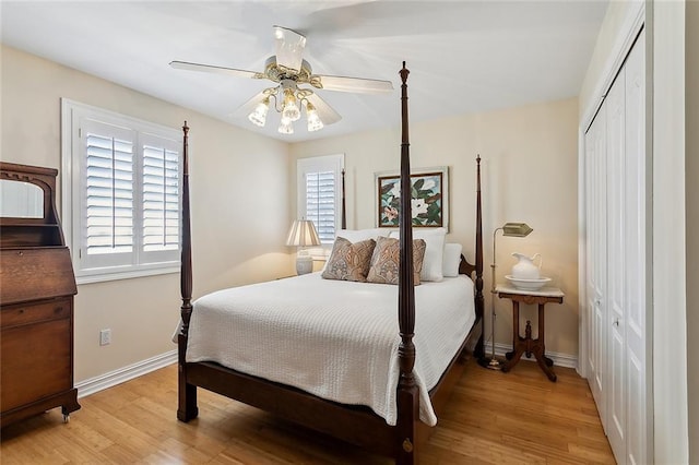4344 Idaho Ave, Kenner, LA 70065 - bedroom featuring baseboards, light wood finished floors, a closet, and a ceiling fan