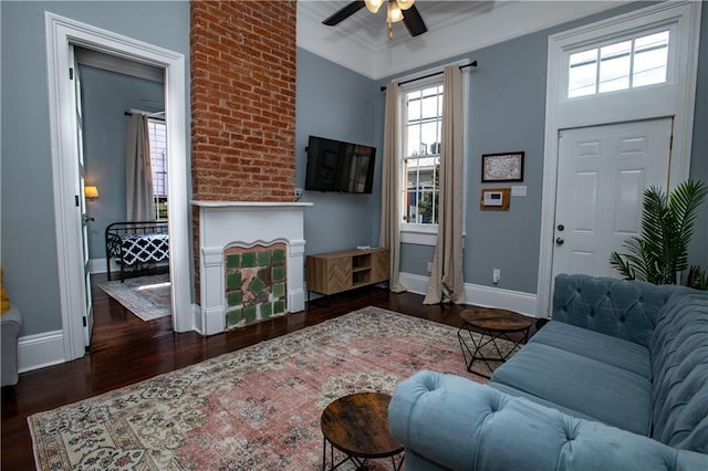 1529 Saint Philip St, New Orleans, LA 70116 - living area featuring wood finished floors, baseboards, ceiling fan, and ornamental molding