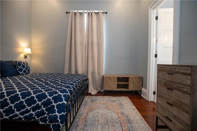 1529 Saint Philip St, New Orleans, LA 70116 - bedroom with wood finished floors and baseboards