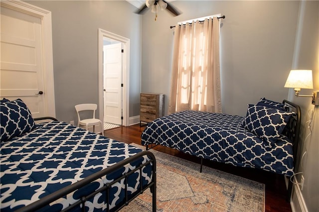 1529 Saint Philip St, New Orleans, LA 70116 - bedroom featuring dark wood finished floors and baseboards