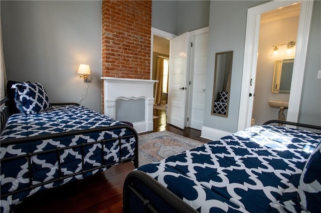 1529 Saint Philip St, New Orleans, LA 70116 - bedroom with wood finished floors and ensuite bathroom