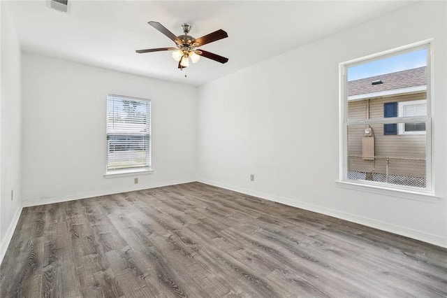 131 Hickory St, Reserve, LA 70084 - empty room with baseboards, a ceiling fan, wood finished floors, and visible vents