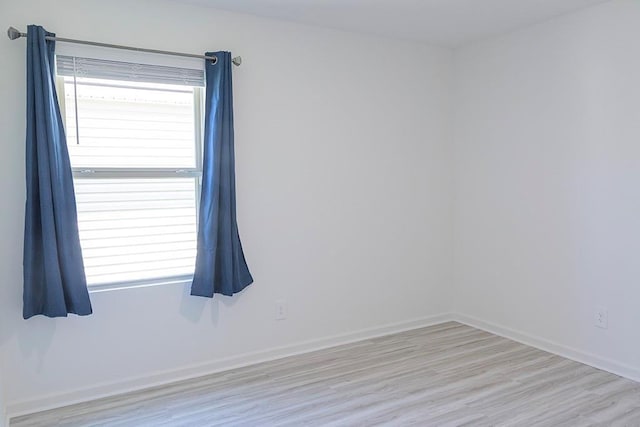 40495 Cara Mae St, Slidell, LA 70461 - spare room featuring baseboards and wood finished floors