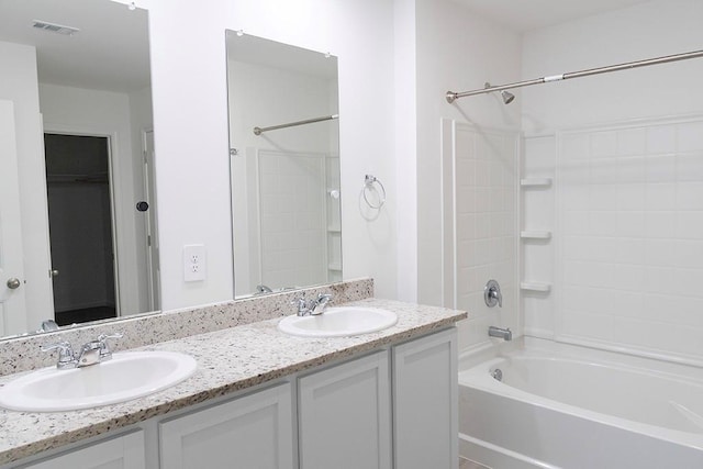 40495 Cara Mae St, Slidell, LA 70461 - bathroom with double vanity, shower / washtub combination, a sink, and visible vents