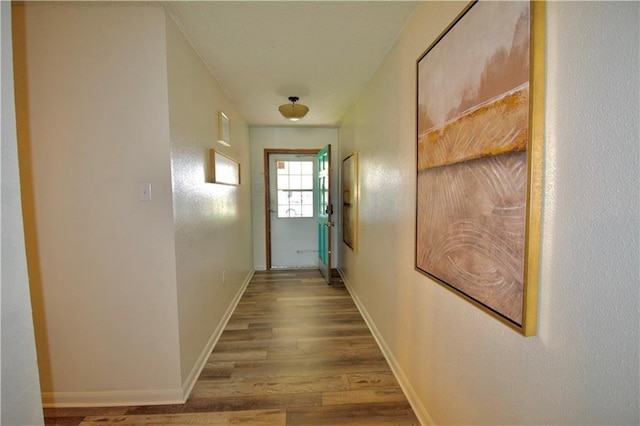 3209 Jennifer Ct, Marrero, LA 70072 - hallway with wood finished floors and baseboards