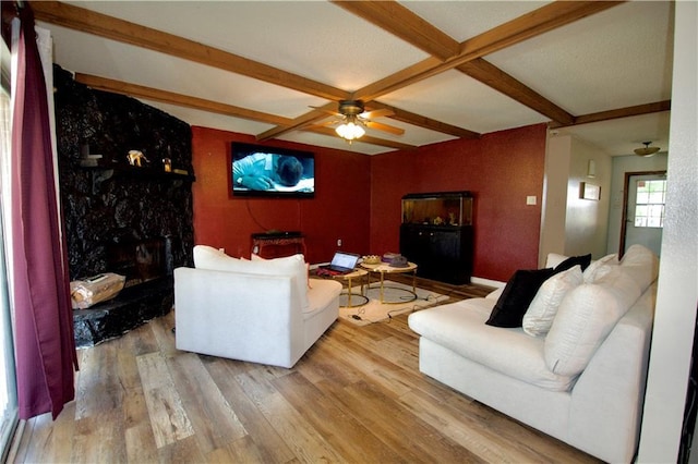 3209 Jennifer Ct, Marrero, LA 70072 - living room featuring a ceiling fan, wood finished floors, beam ceiling, and a premium fireplace