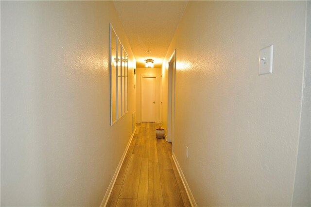 3209 Jennifer Ct, Marrero, LA 70072 - hallway with light wood finished floors and baseboards