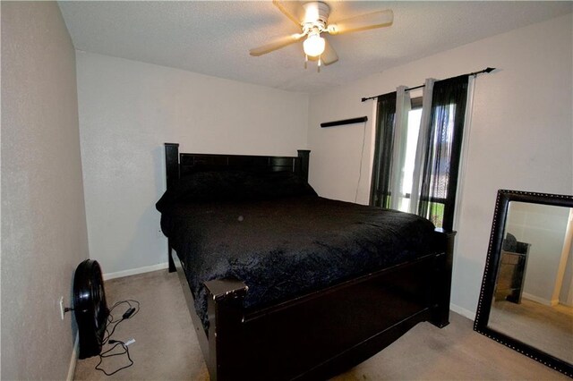 3209 Jennifer Ct, Marrero, LA 70072 - bedroom with baseboards and a ceiling fan