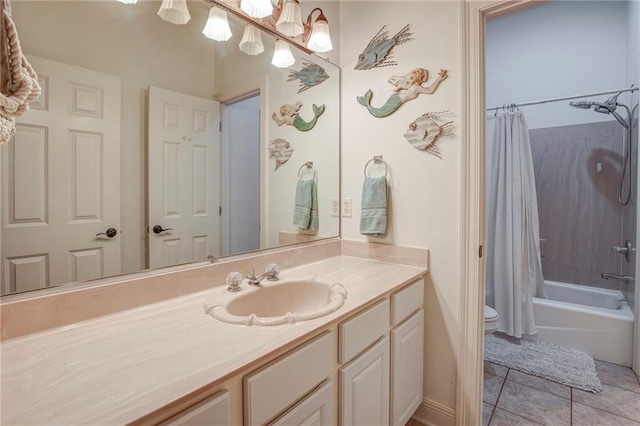 265 Remington Dr, Mandeville, LA 70448 - full bathroom featuring tile patterned floors, vanity, shower / bathtub combination with curtain, an inviting chandelier, and toilet