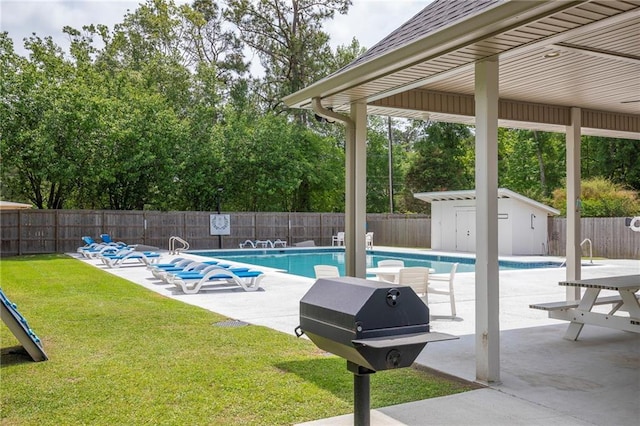 265 Remington Dr, Mandeville, LA 70448 - view of pool featuring a fenced in pool, a lawn, a fenced backyard, and a grill