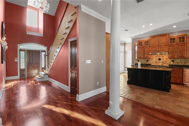 4540 Barataria Blvd, Marrero, LA 70072 - entrance foyer featuring ornamental molding, baseboards, stairway, recessed lighting, and wood finished floors
