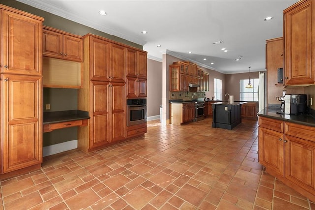 4540 Barataria Blvd, Marrero, LA 70072 - kitchen featuring appliances with stainless steel finishes, recessed lighting, ornamental molding, dark countertops, and decorative backsplash