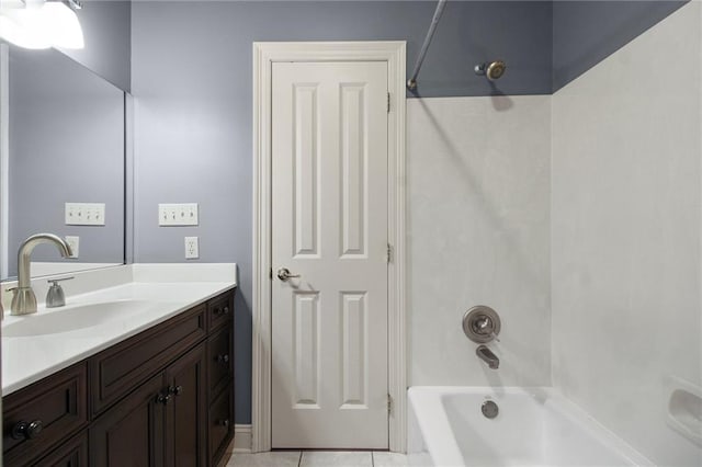 4540 Barataria Blvd, Marrero, LA 70072 - bathroom featuring bathing tub / shower combination, vanity, and tile patterned flooring