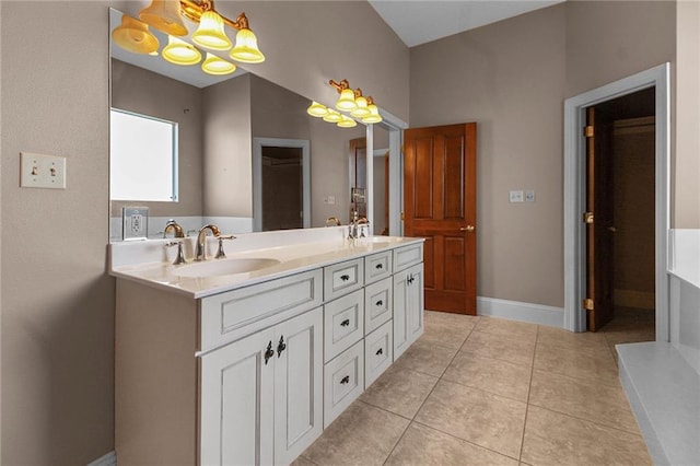4540 Barataria Blvd, Marrero, LA 70072 - bathroom featuring a chandelier, double vanity, and tile patterned flooring