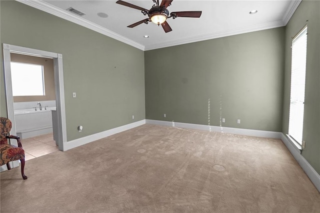 4540 Barataria Blvd, Marrero, LA 70072 - unfurnished room with light carpet, crown molding, a ceiling fan, baseboards, and recessed lighting