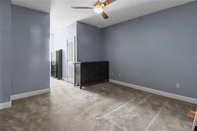4540 Barataria Blvd, Marrero, LA 70072 - unfurnished room with carpet flooring, a ceiling fan, and baseboards