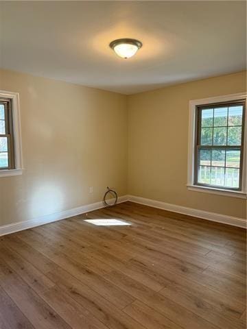 103 Marigold Dr, Covington, LA 70433 - empty room with wood finished floors and baseboards