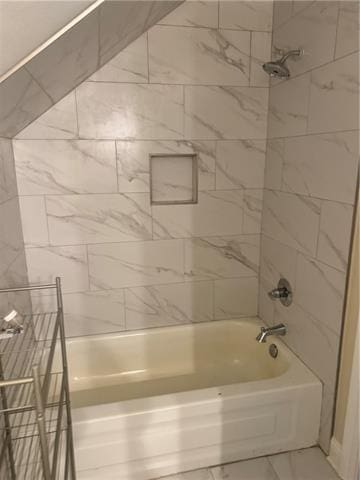 103 Marigold Dr, Covington, LA 70433 - full bathroom featuring marble look tiles and washtub / shower combination
