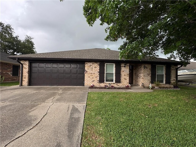 ranch-style house featuring driveway, brick siding, a front lawn, and a garage