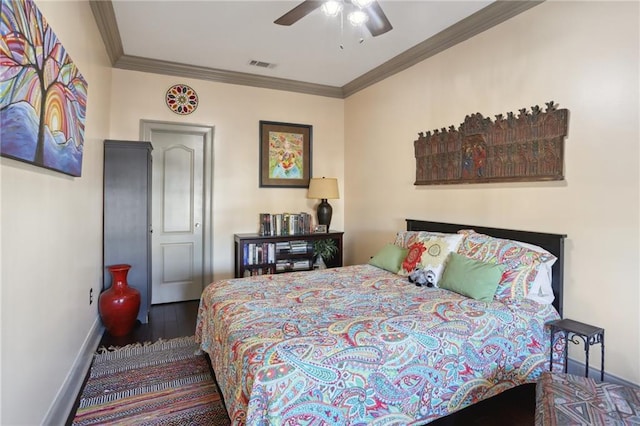 2634 Marengo St, New Orleans, LA 70115 - bedroom with visible vents, baseboards, and ornamental molding