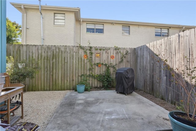 2634 Marengo St, New Orleans, LA 70115 - view of patio with a fenced backyard and area for grilling