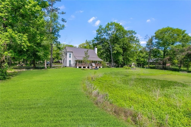 view of yard featuring a deck