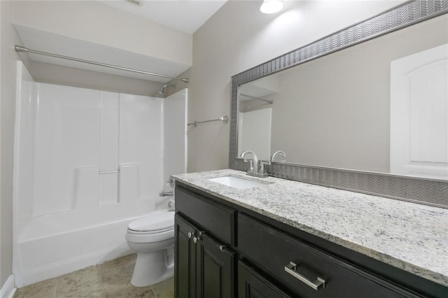 bathroom with toilet, vanity, and bathtub / shower combination