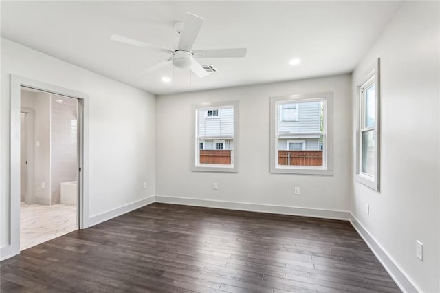 3824 Nashville Ave, New Orleans, LA 70125 - unfurnished bedroom with baseboards, dark wood finished floors, and recessed lighting