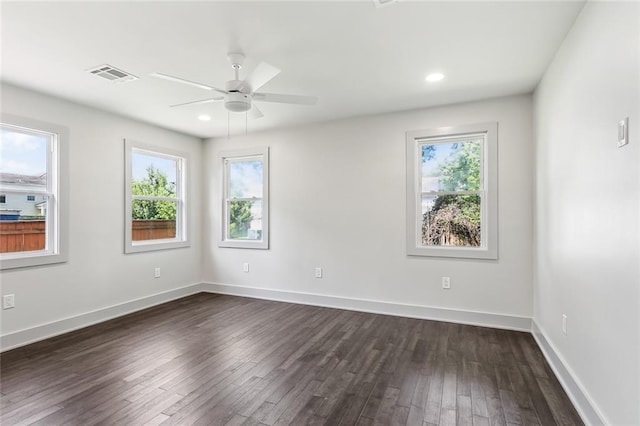 3824 Nashville Ave, New Orleans, LA 70125 - spare room with a wealth of natural light, visible vents, dark wood-style flooring, and ceiling fan