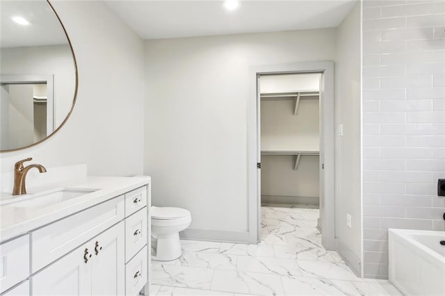 3824 Nashville Ave, New Orleans, LA 70125 - full bath featuring toilet, marble finish floor, vanity, recessed lighting, and baseboards