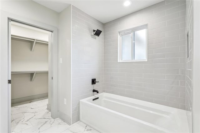 3824 Nashville Ave, New Orleans, LA 70125 - bathroom with marble finish floor, recessed lighting, a walk in closet, baseboards, and bathtub / shower combination