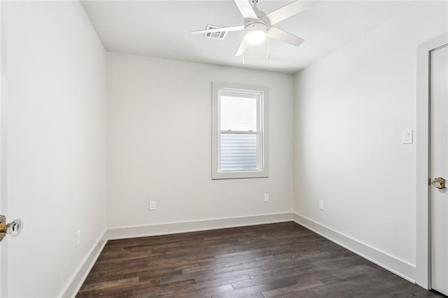 3824 Nashville Ave, New Orleans, LA 70125 - spare room featuring visible vents, baseboards, ceiling fan, and dark wood-style floors