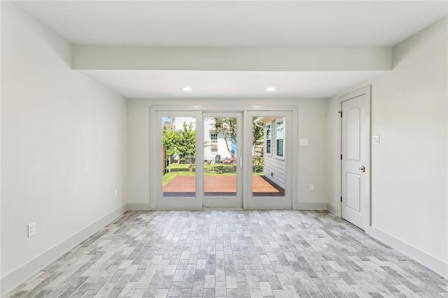 3824 Nashville Ave, New Orleans, LA 70125 - unfurnished room featuring wood finished floors, baseboards, and recessed lighting