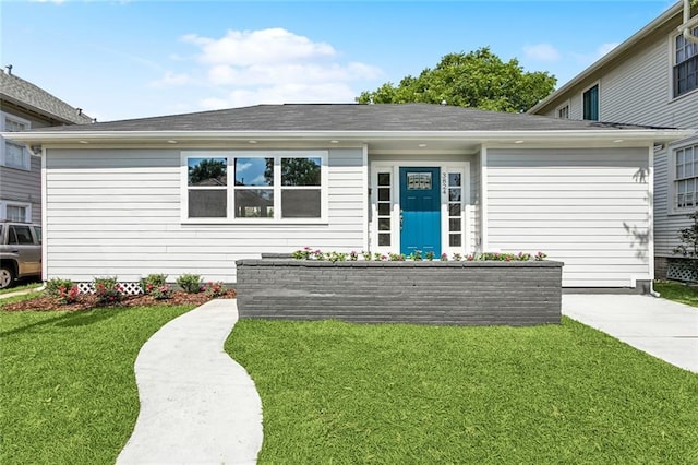 3824 Nashville Ave, New Orleans, LA 70125 - single story home featuring driveway, roof with shingles, a front yard, and a garage