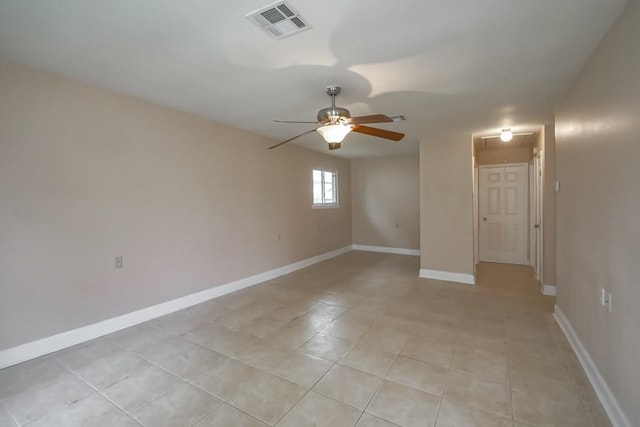 3760 W Louisiana State Dr, Kenner, LA 70065 - unfurnished room featuring attic access, baseboards, visible vents, ceiling fan, and light tile patterned floors